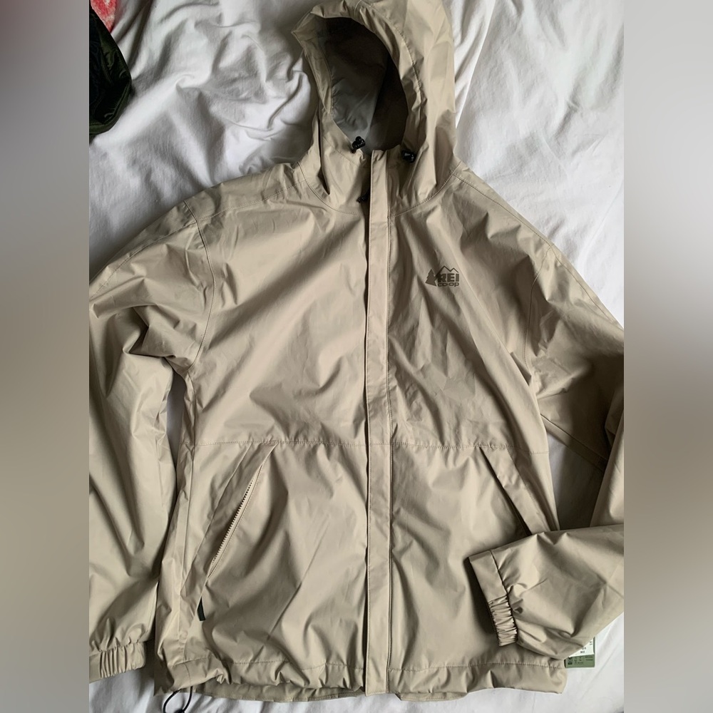 BRAND NEW REI Trained Stone Rain Jacket